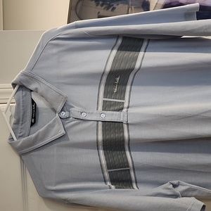 Travis Mathew baby blue golf shirt